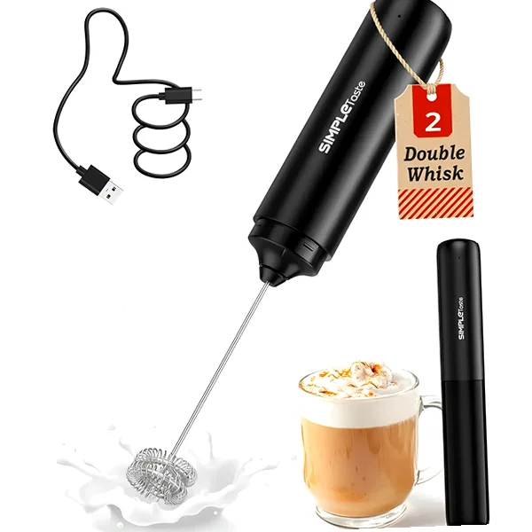 Rechargeable frother wand with stainless whisk next to a cup of matcha